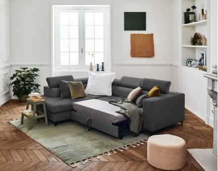 Canapé d'angle gauche 5 places convertible avec coffre et têtières en tissu Olinda