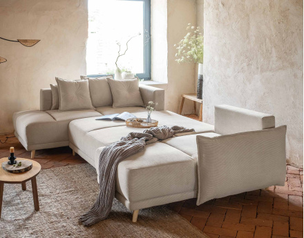 Canapé panoramique d'angle gauche 7 places convertible avec coffre en velours côtelé Lena