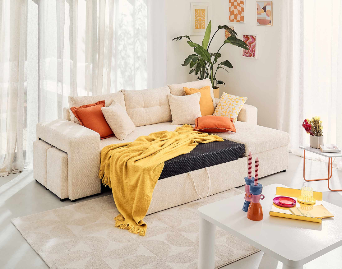 Canapé d'angle réversible 4 places convertible avec coffre, étagère et poufs en velours texturé California