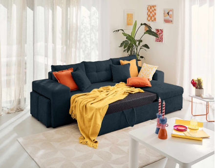 Canapé d'angle réversible 4 places convertible avec coffre, étagère et poufs en velours texturé California