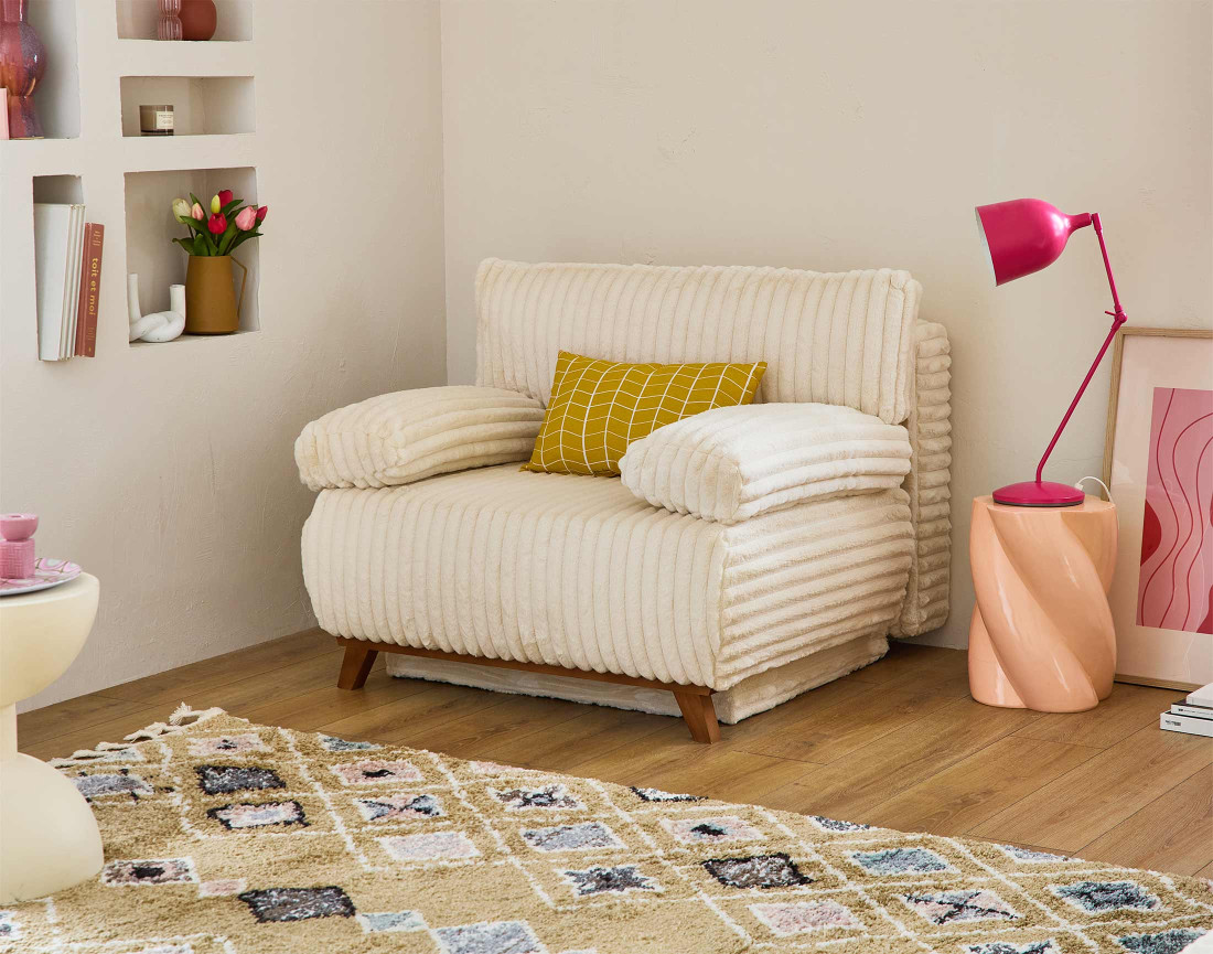 Fauteuil convertible avec coffre en fausse fourrure côtelée Cristal