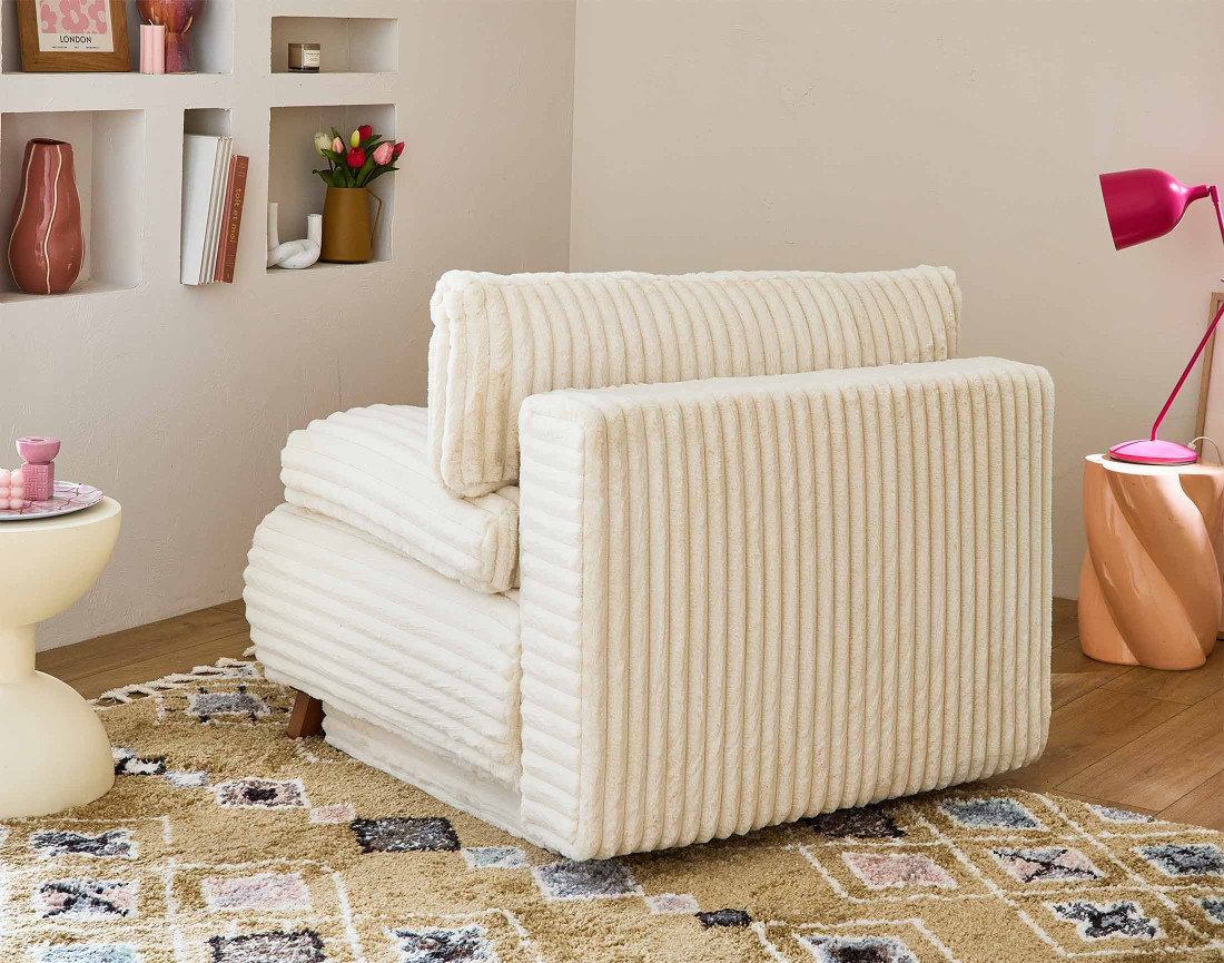 Fauteuil convertible avec coffre en fausse fourrure côtelée Cristal