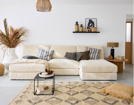 Canapé panoramique modulable en fausse fourrure côtelée