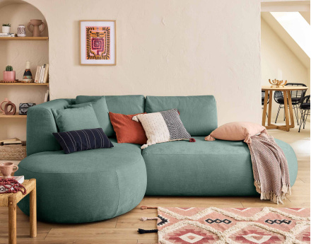 Canapé modulable d'angle gauche 4 places avec pouf en tissu texturé Santorini