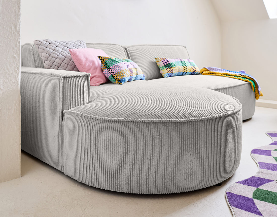Canapé d'angle gauche aux formes arrondies 4 places en velours côtelé Spiaggia