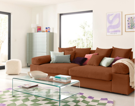 Canapé 4 places avec une assise profonde en velours côtelé