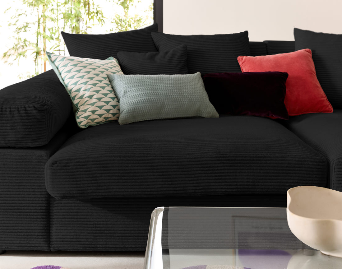 Canapé 4 places avec une assise profonde en velours côtelé