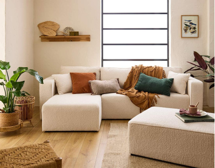 Canapé d'angle 4 places convertible avec coffre en tissu bouclette Topaze