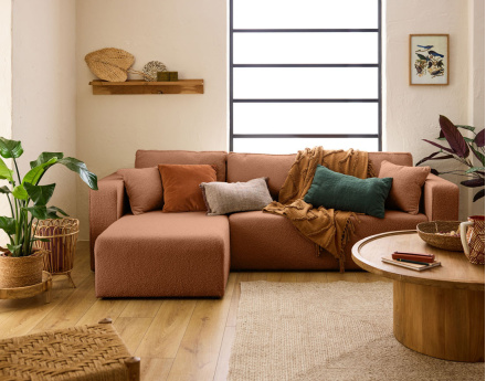 Canapé d'angle 4 places convertible avec coffre en tissu bouclette Topaze