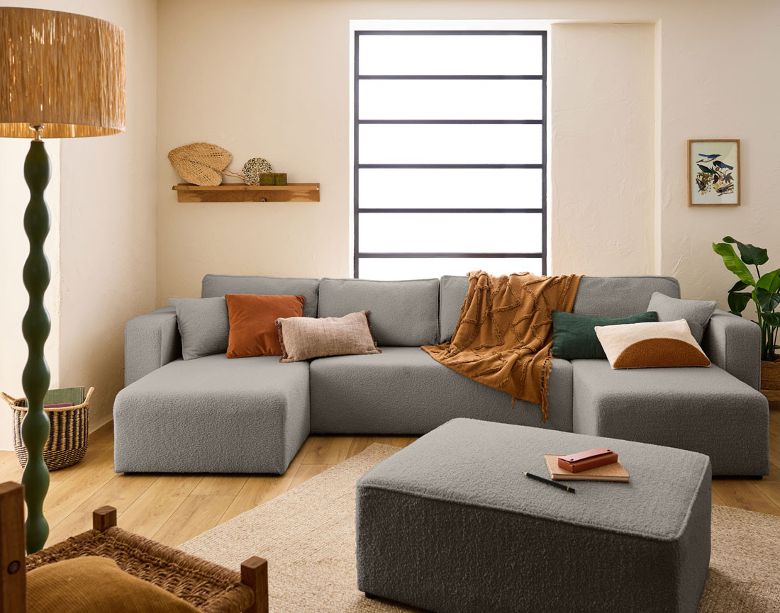 Canapé panoramique en U 7 places convertible avec coffre en tissu bouclette Topaze