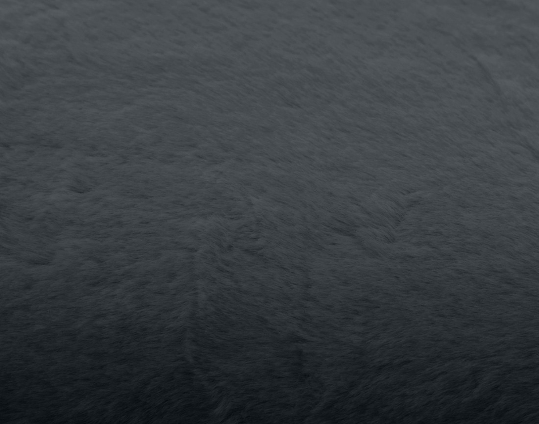 Coussin en fausse fourrure 60x60 cm Oscar