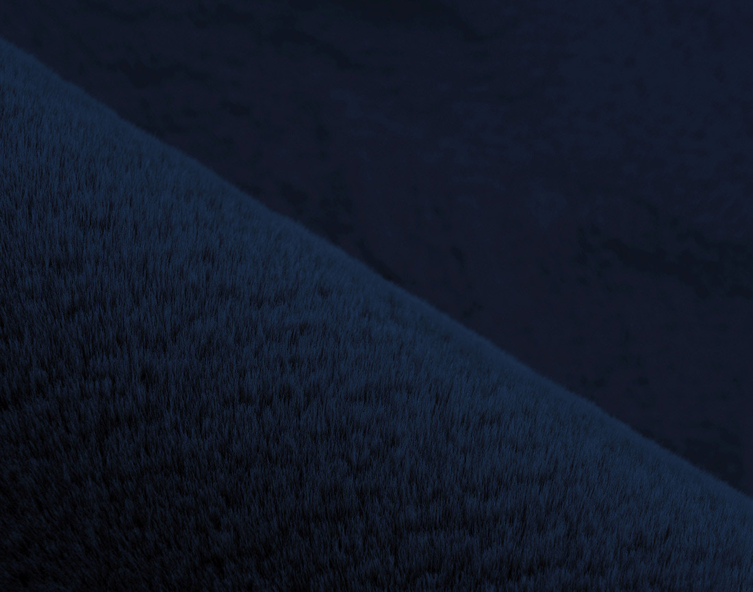 Tapis organique fausse fourrure bleu Joy