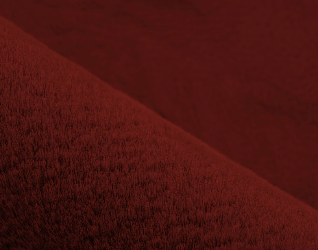 Tapis organique fausse fourrure rouge Joy