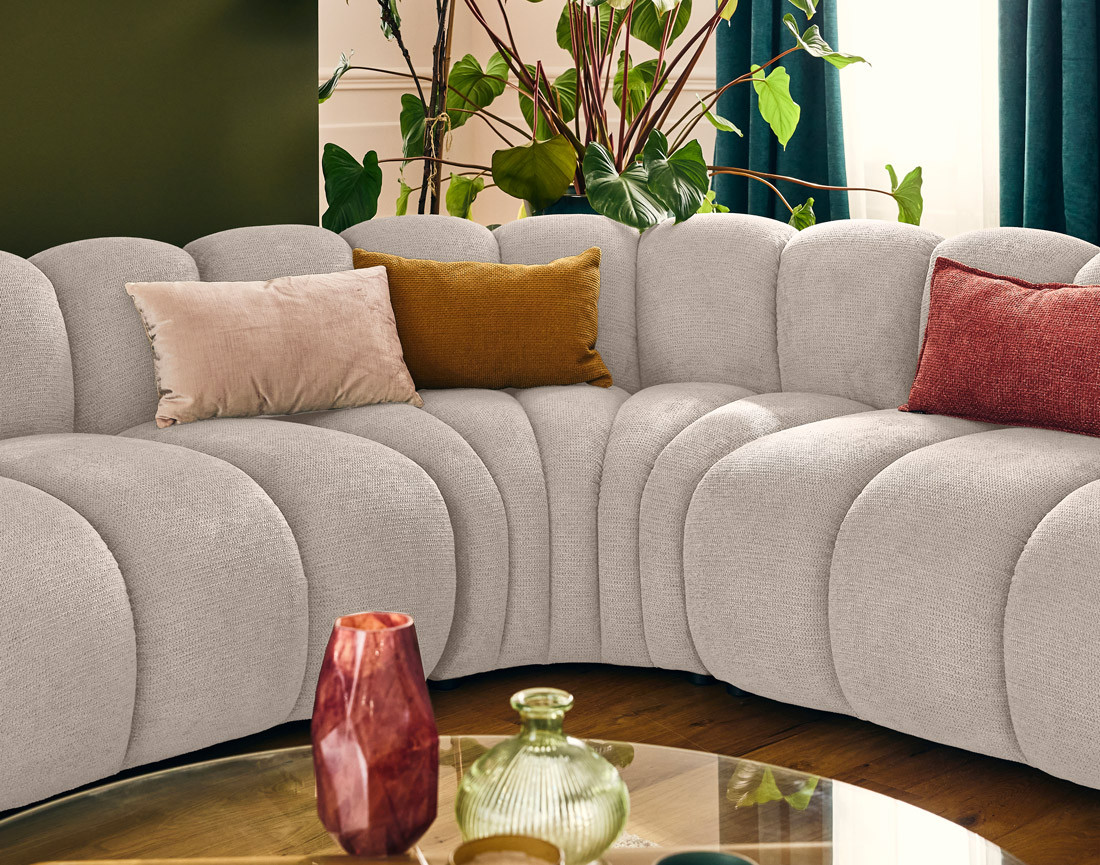 Canapé modulable d'angle droit 5 places en tissu texturé Debbie