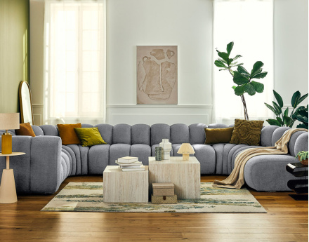 Canapé modulable panoramique d'angle droit 7 places en tissu texturé Debbie