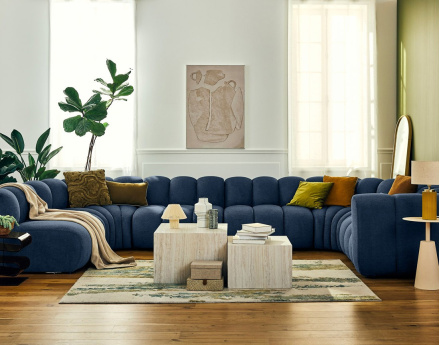 Canapé modulable panoramique d'angle gauche 7 places en tissu texturé Debbie