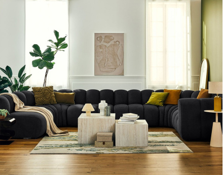 Canapé modulable panoramique d'angle gauche 7 places en tissu texturé Debbie