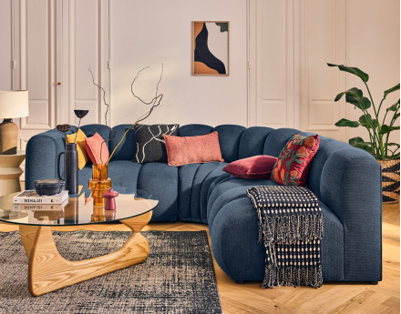 Canapé modulable d'angle droit 4 places avec accoudoir en tissu texturé Debbie