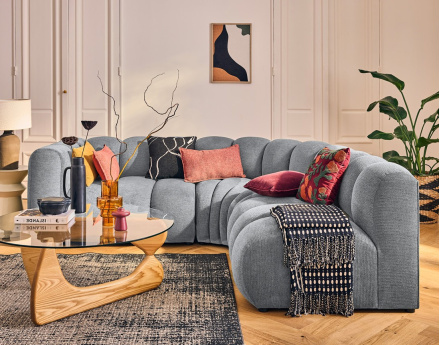 Canapé modulable d'angle droit 4 places avec accoudoir en tissu texturé Debbie