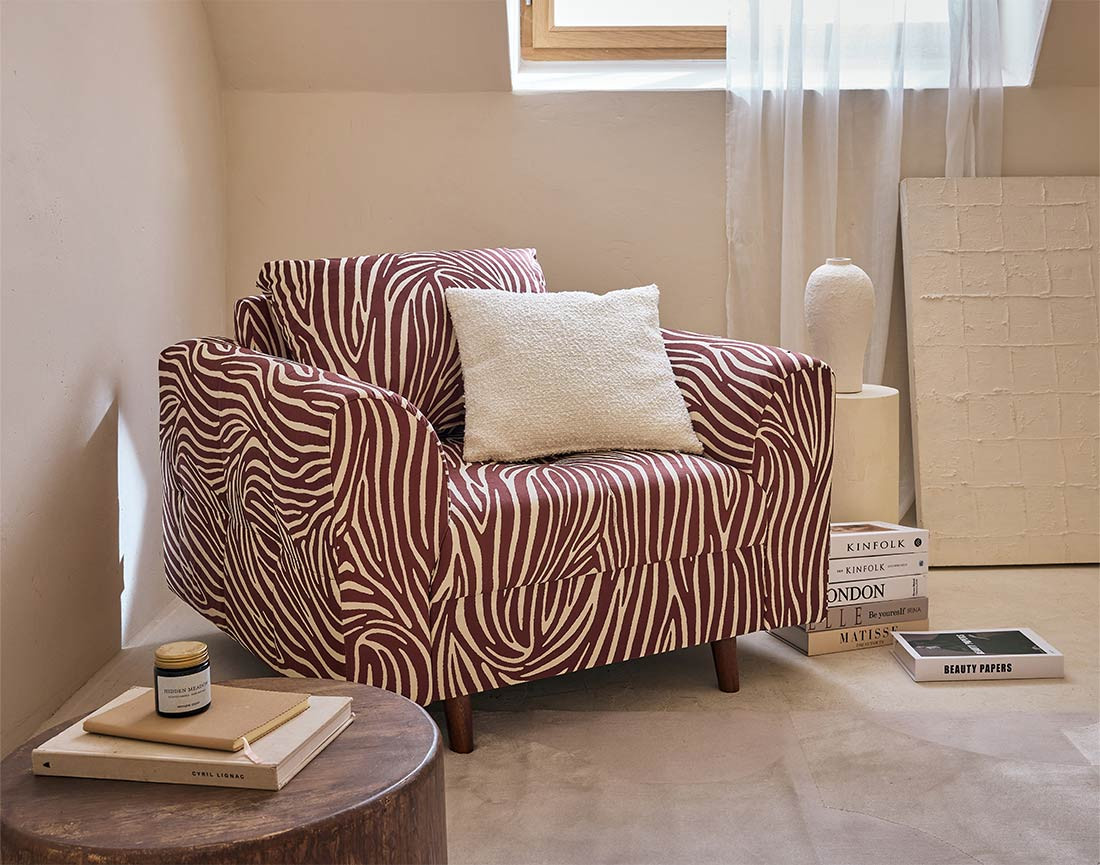 Fauteuil zèbre en velours Rune